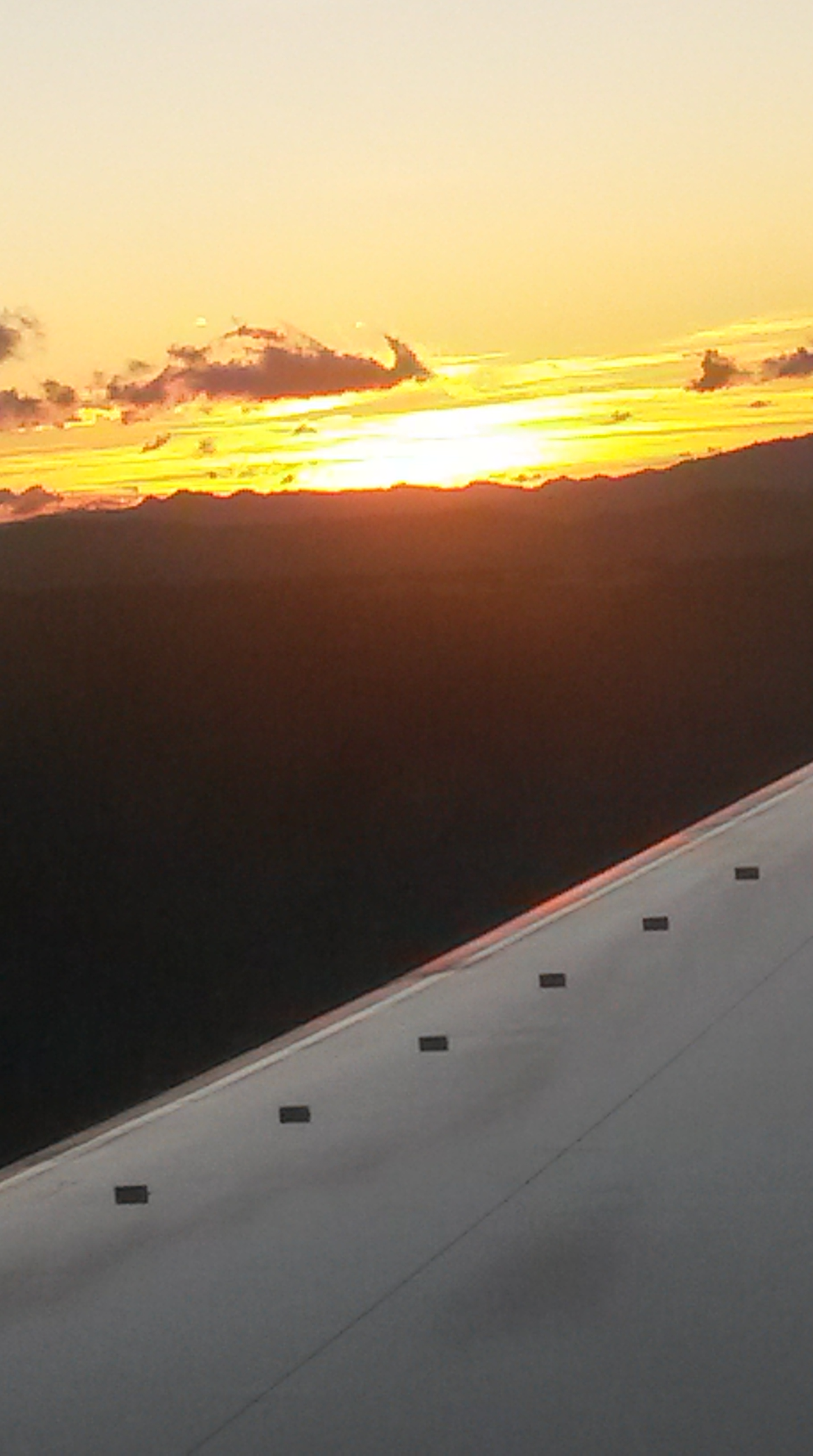 Sunrise over Guatemala City as we touch down at 6 a.m.
