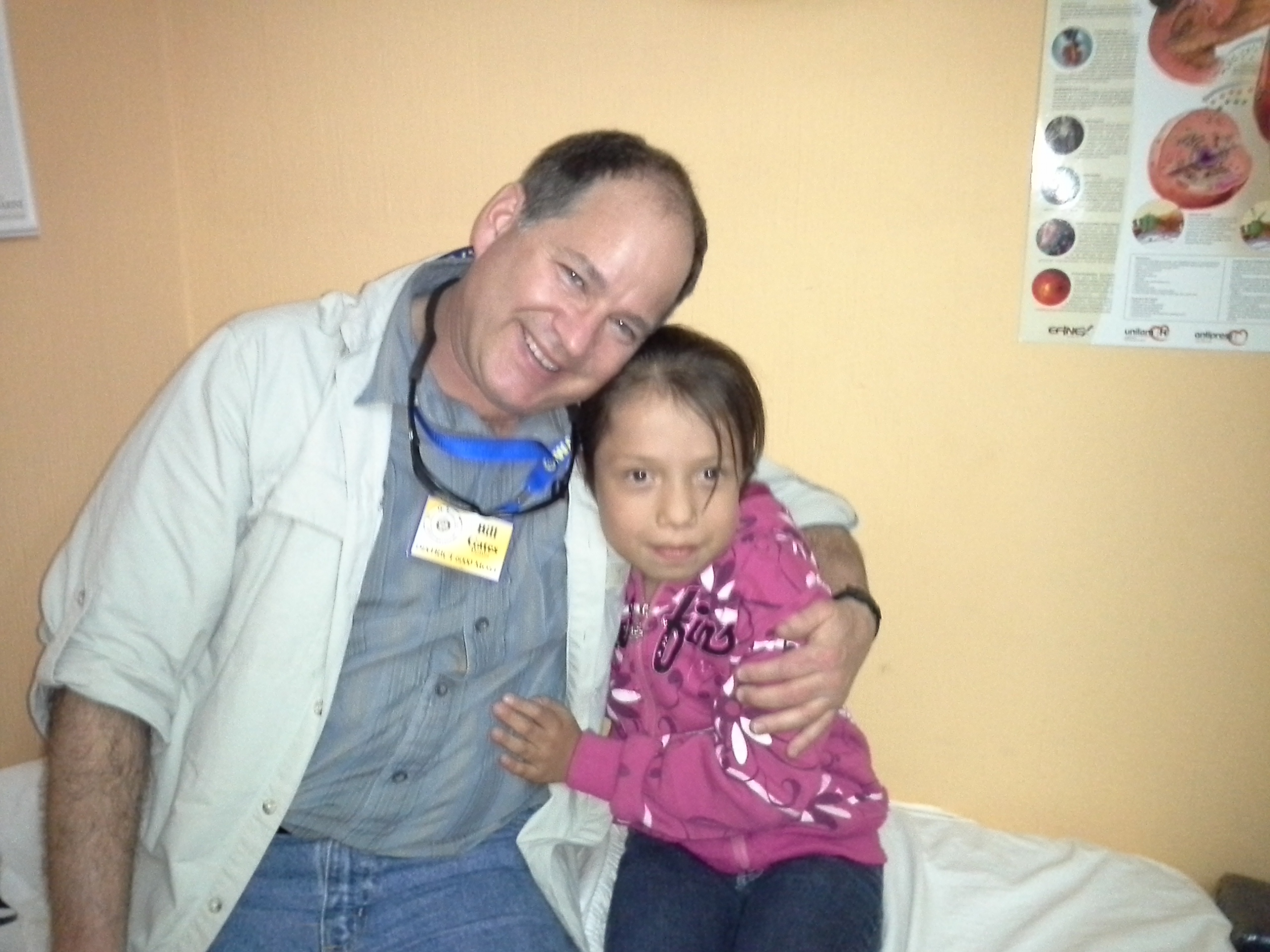 Dr. Bill with Dulce Maria during a speech therapy session.