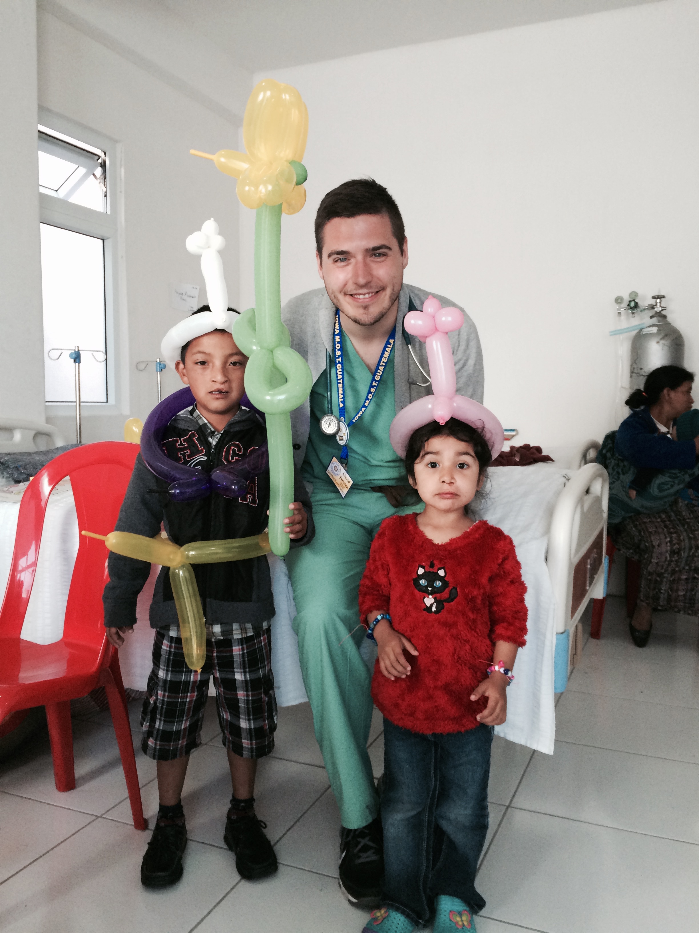 Med student David shows off his other talent - balloon animals!