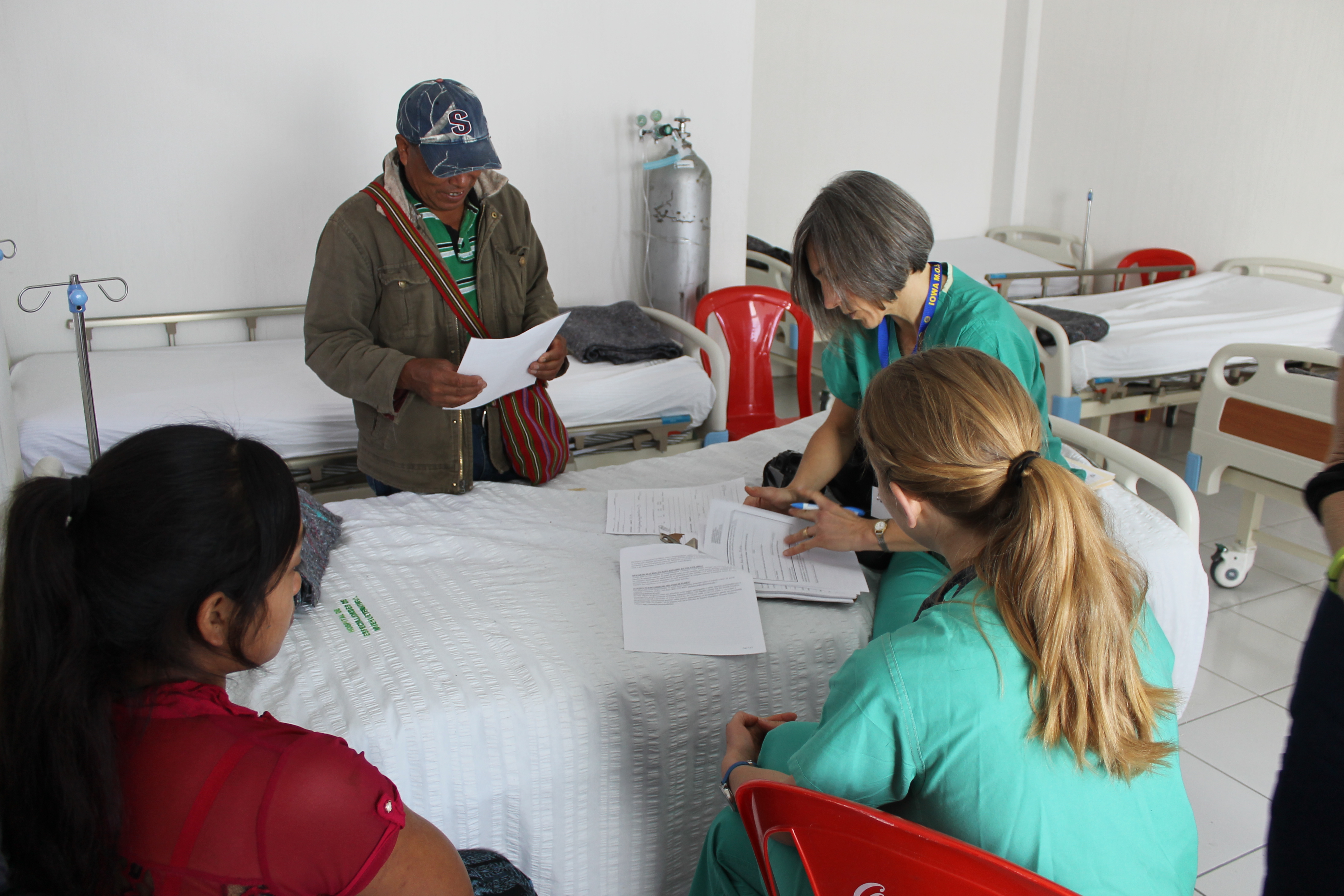 Martine speaks to parents about taking part in her research.  She says about 90% says yes.